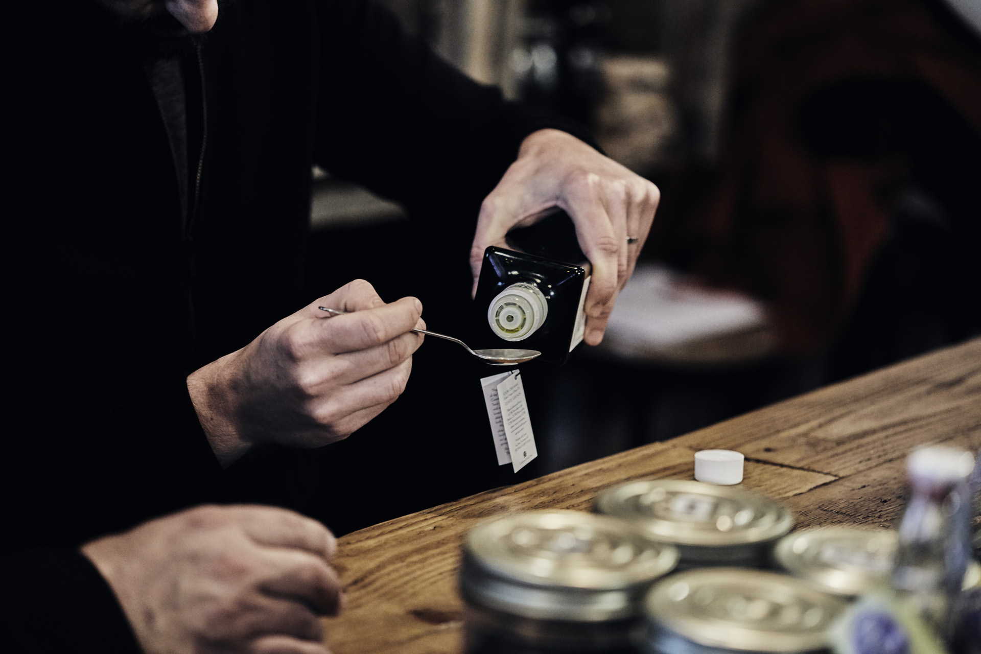 Yoni Saada tasting high-quality olive oil at his Bagnard restaurant in Paris